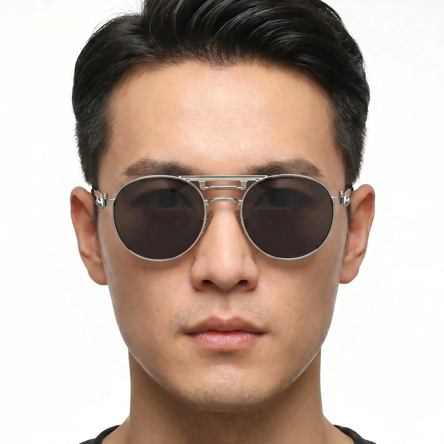 Aurex silver round metal-frame sunglasses with dark lenses worn by model – Astroshadez