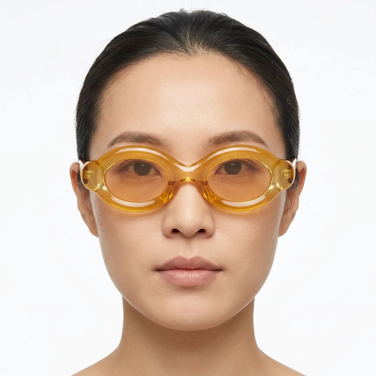 Elyndra translucent amber oval-lens sunglasses with amber frame and lenses – Astroshadez