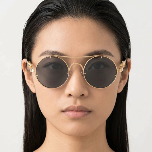AureonLuxuria goldtone round sunglasses with dark lenses; metal rim and double bridge – Astroshadez