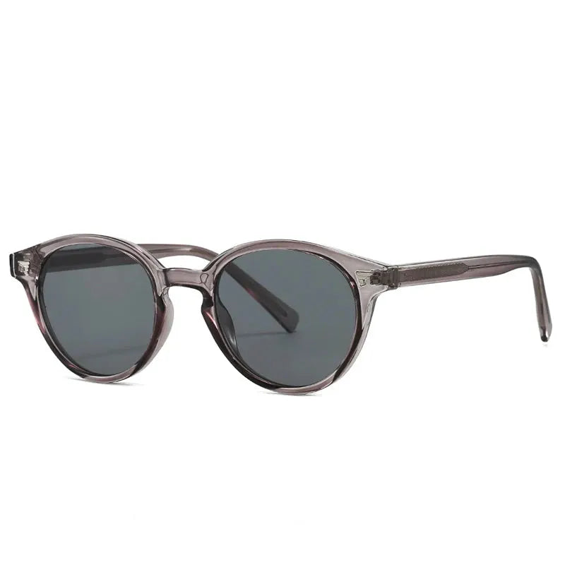 SHAUNA round sunglasses, translucent mauve frame with dark gray lenses, retro rivet detail – Astroshadez
