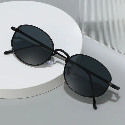 SHAUNA oval metal sunglasses with black frame and blue-purple gradient lenses – Astroshadez