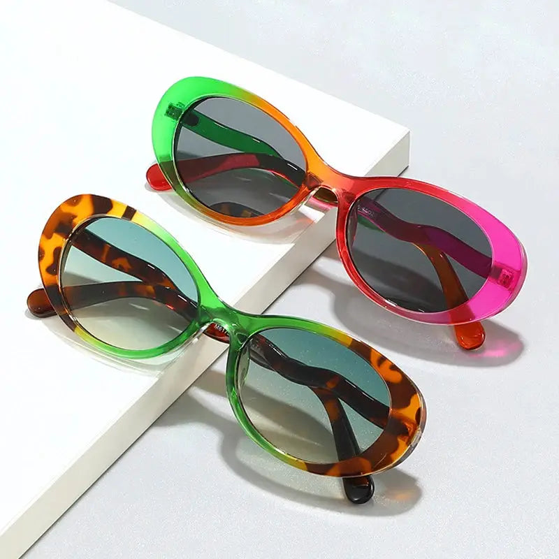 SHAUNA oval sunglasses trio with translucent neon green/orange, pink, and tortoiseshell frames, gray lenses – Astroshadez