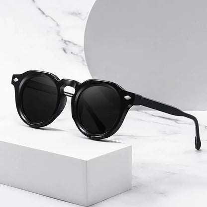 SHAUNA retro round sunglasses with black frame and dark lenses, rivet accents – Astroshadez