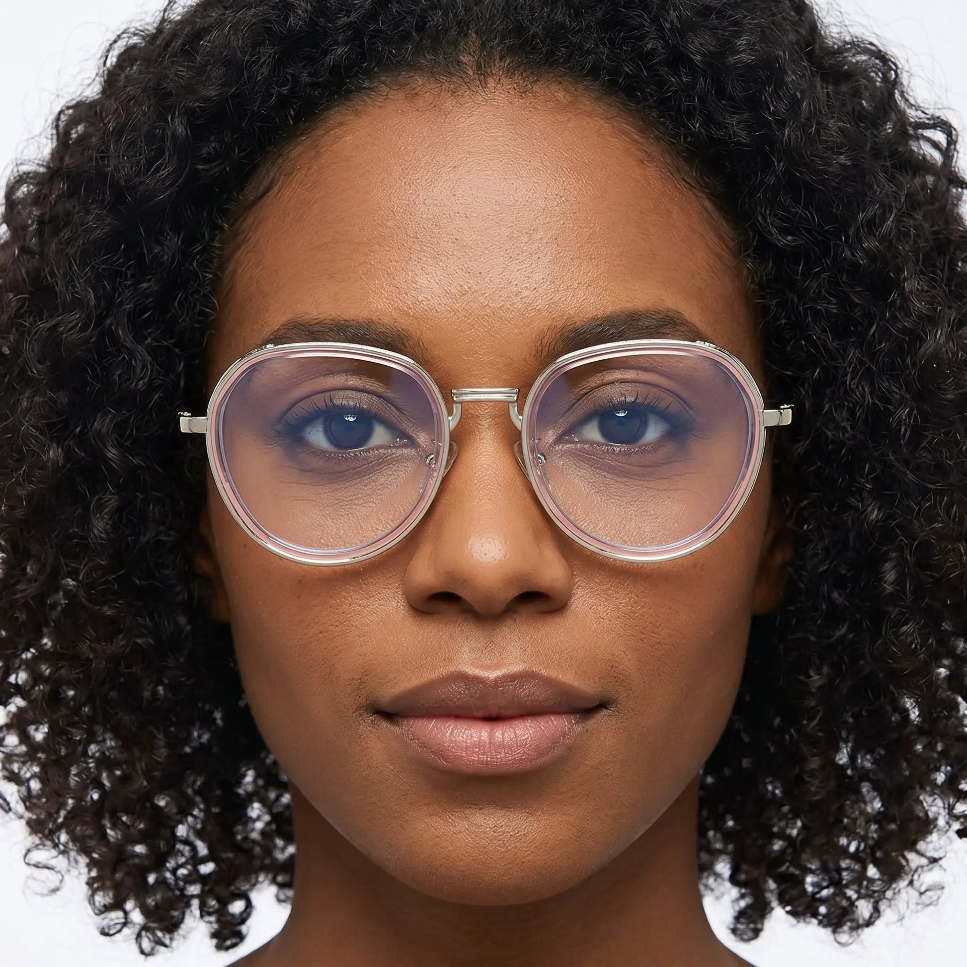 Lumora rose-gold oval gradient sunglasses worn by a model – Astroshadez