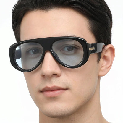 Aurexis matte black oversized sunglasses with blue mirrored lenses; square frame with gold temple detail – Astroshadez