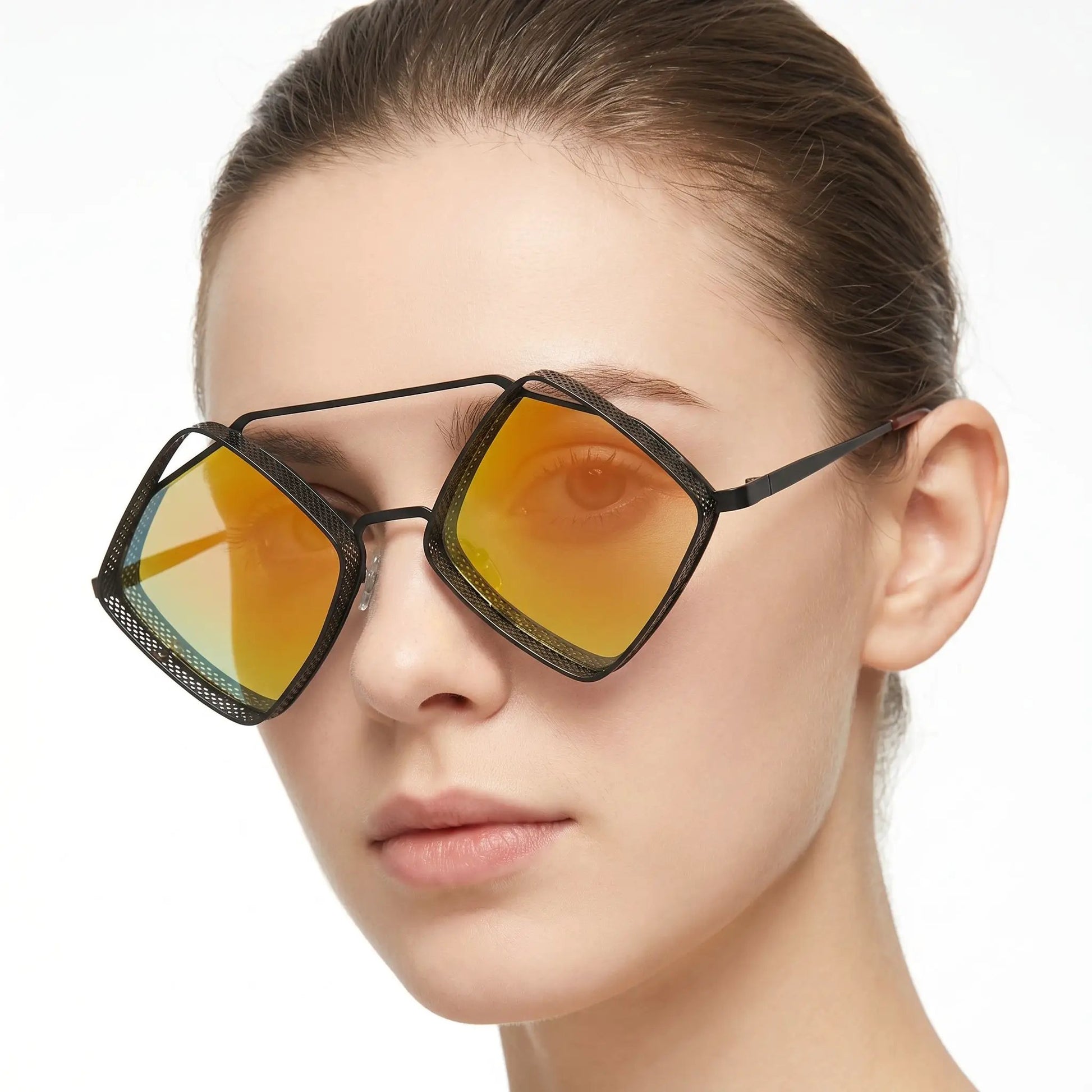 Lumera Obsidian hollow-frame sunglasses with gradient mirror orange-to-gold lenses on model – Astroshadez
