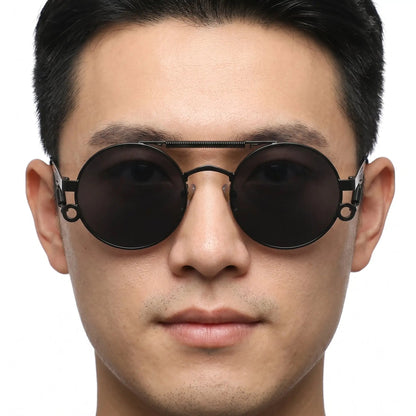 Noctis matte black metal round double-bridge sunglasses with dark lenses on a man's face – Astroshadez