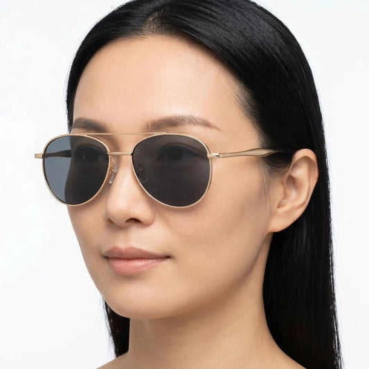 Xyrion gold metal aviator sunglasses with dark lenses and slim gold frame – Astroshadez