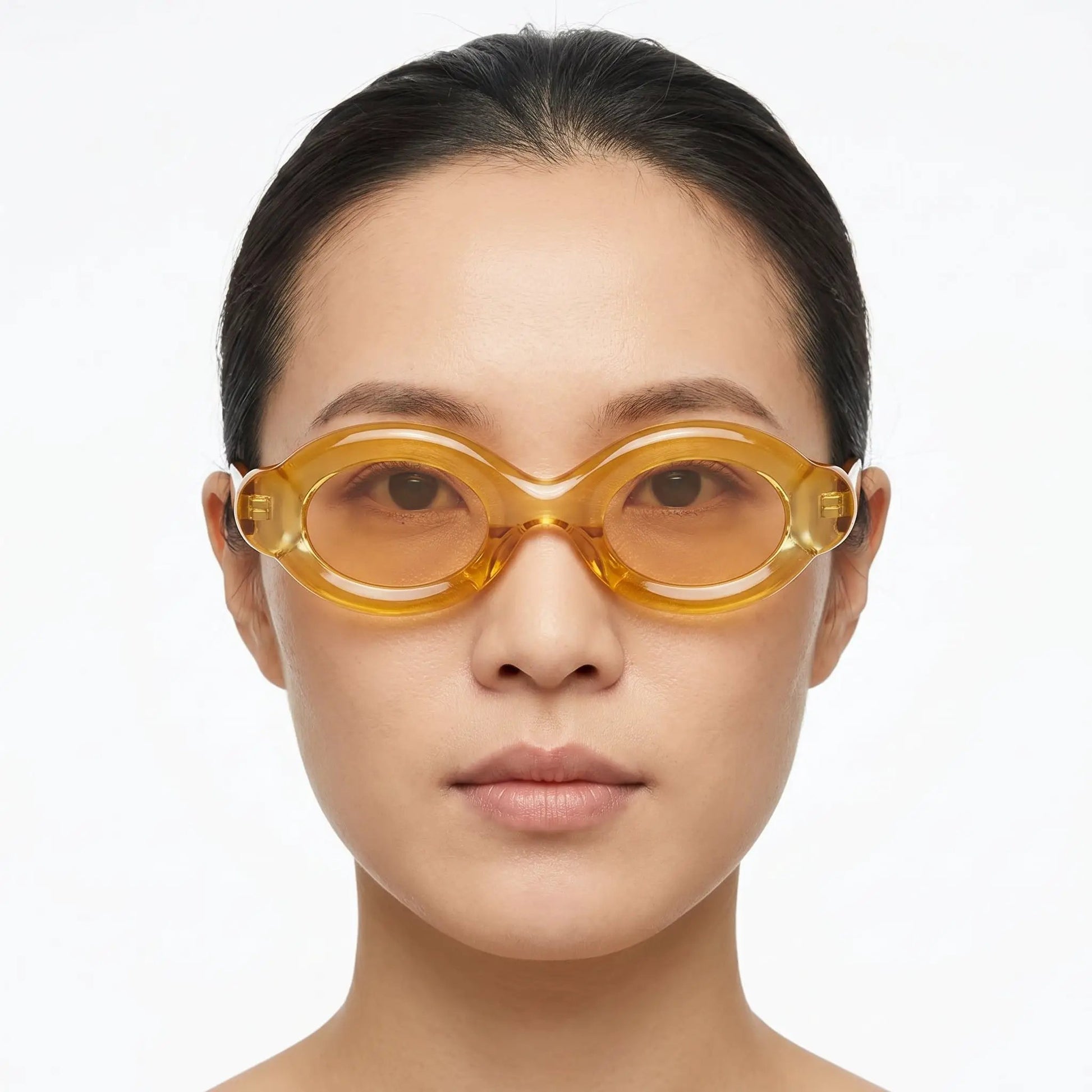 Elyndra translucent amber oval-lens sunglasses with amber frame and lenses – Astroshadez