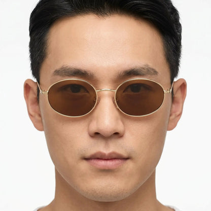 Solante Gold Metal Gradient Oval Sunglasses with gold frame and brown gradient lenses – Astroshadez
