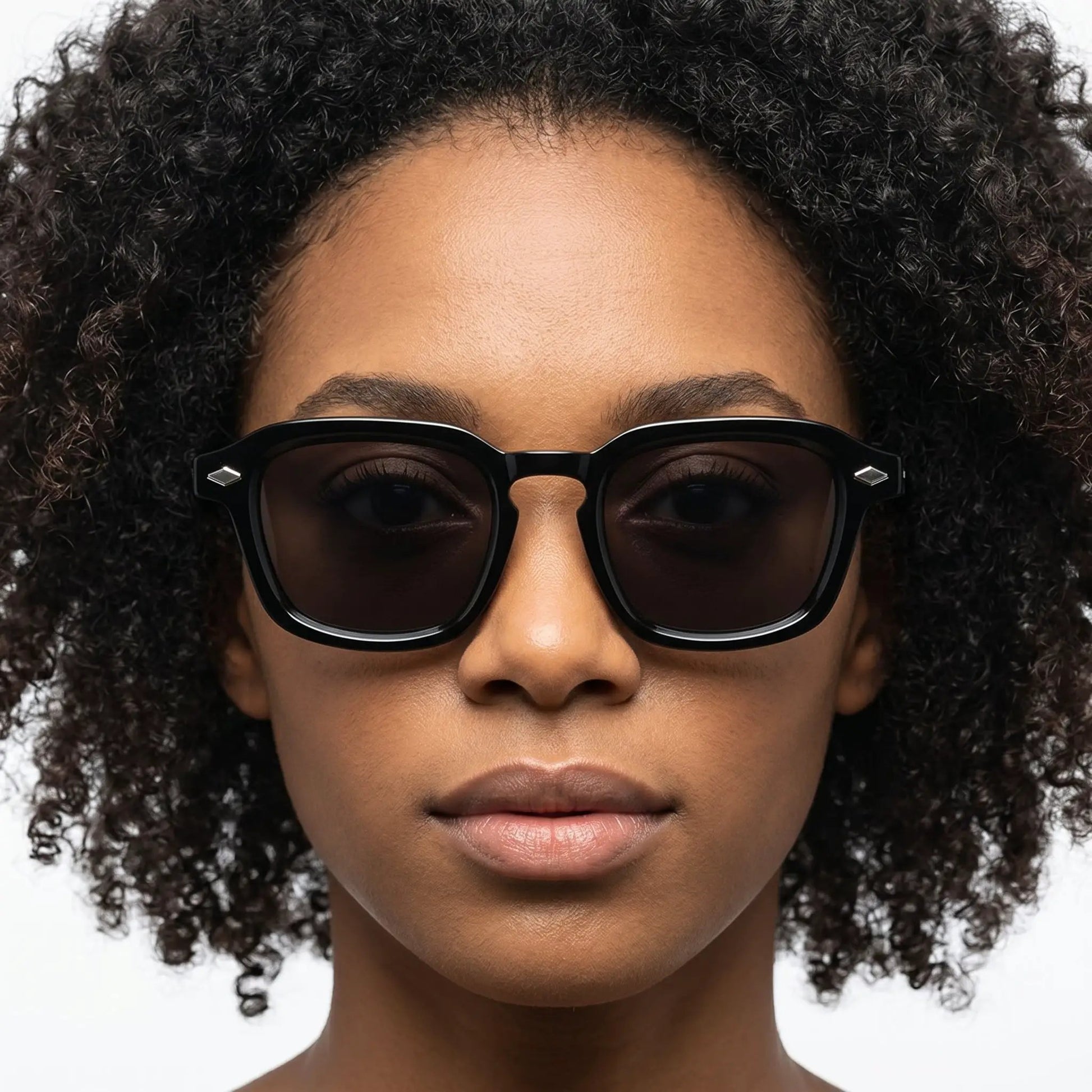Velorin Black Riveted Square Sunglasses with a thick black frame and dark lenses – Astroshadez