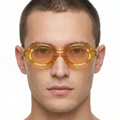 Elyndra sunglasses, translucent amber oval lenses, orange frame – Astroshadez