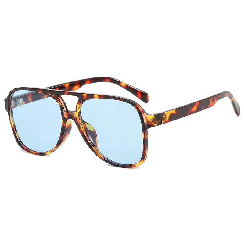 Pilot-style sunglasses in tortoiseshell frame with light blue UV400 lenses for a retro, chic look – Astroshadez