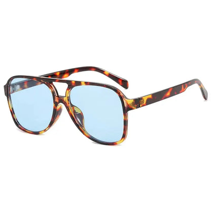 Pilot-style sunglasses in tortoiseshell frame with light blue UV400 lenses for a retro, chic look – Astroshadez