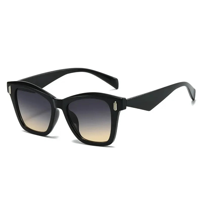 SHAUNA cat-eye sunglasses, black frame with rivet accents and gradient UV400 lenses from black to amber – Astroshadez
