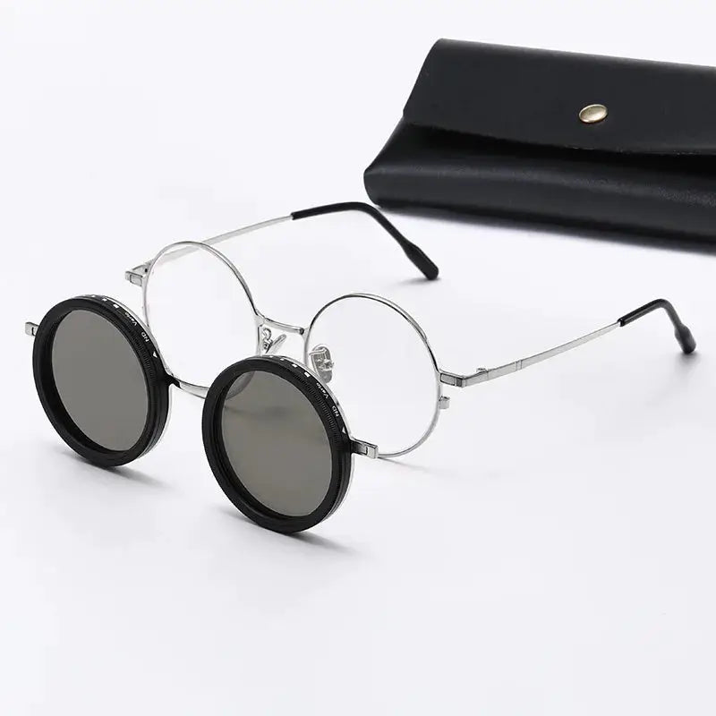 Round metal-frame sunglasses with black-rimmed circular gray polarized lenses; includes case – Astroshadez