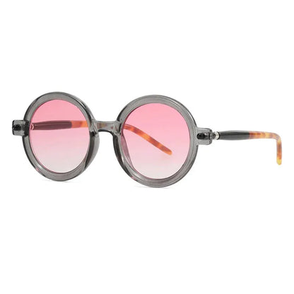 SHAUNA round sunglasses with translucent gray frames and pink gradient lenses, tortoiseshell temples – Astroshadez