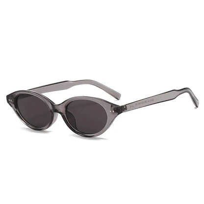 SHAUNA cat-eye sunglasses, translucent gray frame with dark oval lenses, rivet accents – Astroshadez