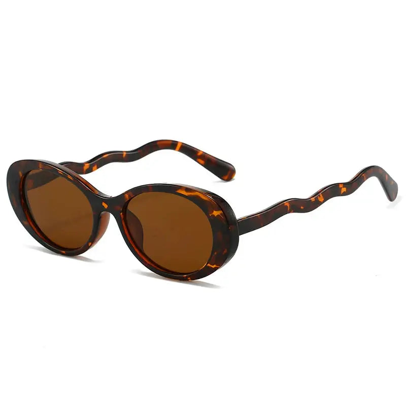 SHAUNA oval tortoiseshell sunglasses with brown gradient lenses and wavy temples – UV400 – Astroshadez