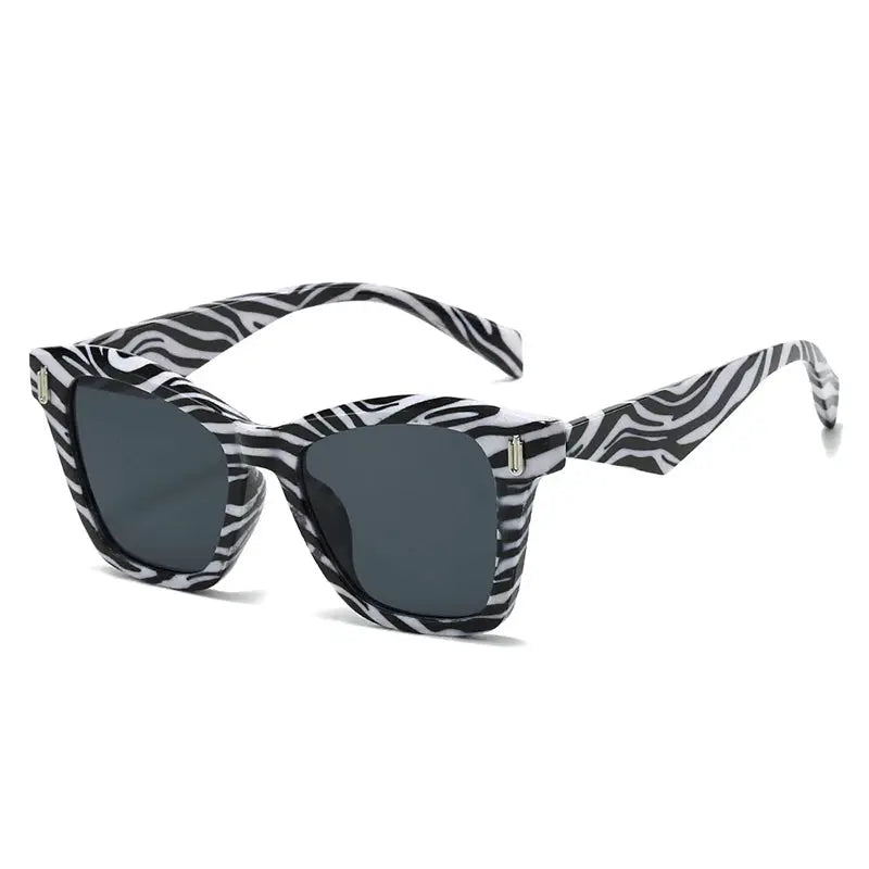 SHAUNA Cat Eye sunglasses with zebra-print frame and dark gray lenses – Astroshadez